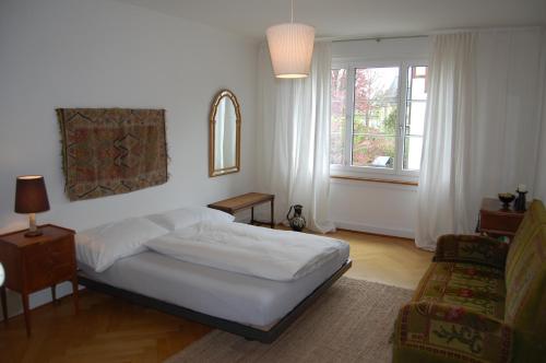 Postel nebo postele na pokoji v ubytování Maison Mosgenstein