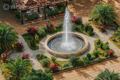 an overhead view of a fountain in a garden at Dreamland Oasis Hotel Chakvi in Chakvi