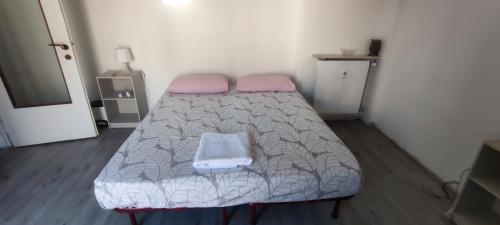 Katil atau katil-katil dalam bilik di Slataper 22 - Sunny, Central and Confortable