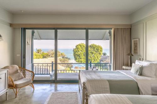 Postel nebo postele na pokoji v ubytování Devasom Hua Hin Resort