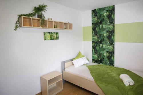 Postel nebo postele na pokoji v ubytování Work & Stay Apartment