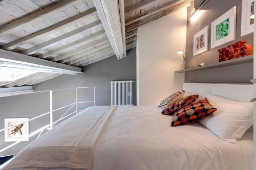 Cama o camas de una habitación en Mamo Florence - St Elizabeth Loft Apartments