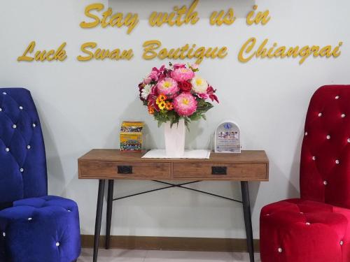 Χώρος καθιστικού στο Luckswan Boutique Chiang Rai - SHA Extra Plus