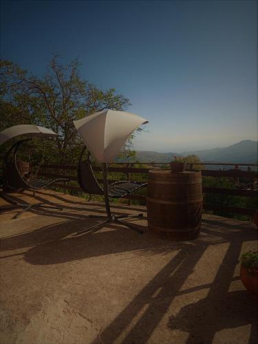 a white object sitting on the side of a patio at To Konaki in Synikia Mesi Trikalon