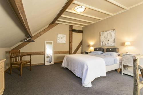 Postel nebo postele na pokoji v ubytování De Zeeuwsche Hoeve