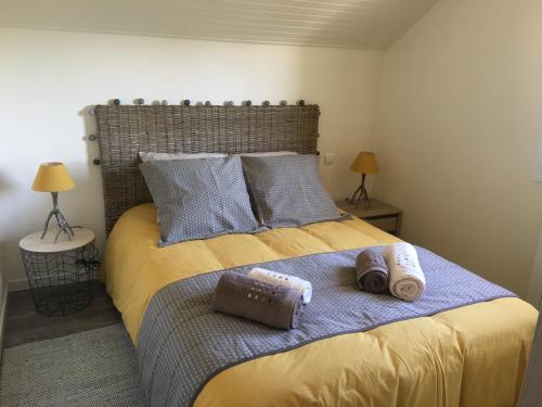En eller flere senge i et værelse på Les Gîtes du Lachat