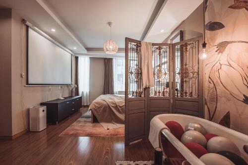Ένα ή περισσότερα κρεβάτια σε δωμάτιο στο Tianjin G'apartment - Five Great Avenues