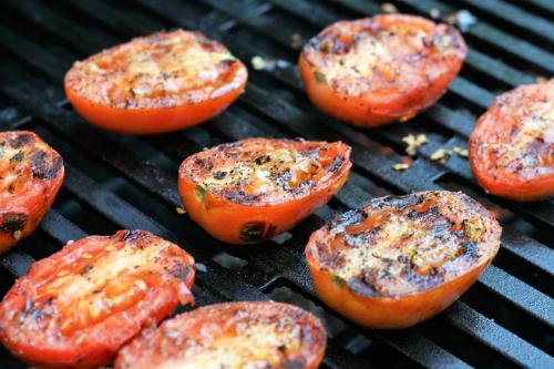 a group of peppers cooking on a grill at The Seyyida Hotel and Spa in Zanzibar City