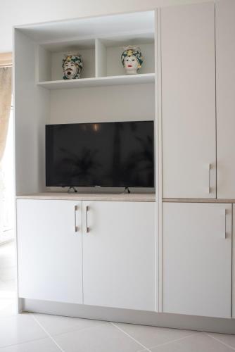 TV a/nebo společenská místnost v ubytování Oasi Smart Rooms