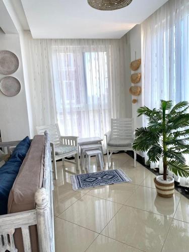 Χώρος καθιστικού στο Nyali Emirates Reef Apartment