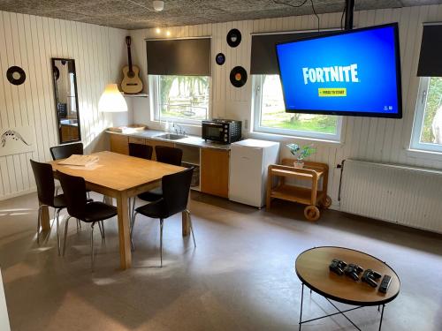 TV o dispositivi per l'intrattenimento presso Hestkær Family Rooms