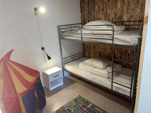 Letto o letti in una camera di Hestkær Family Rooms