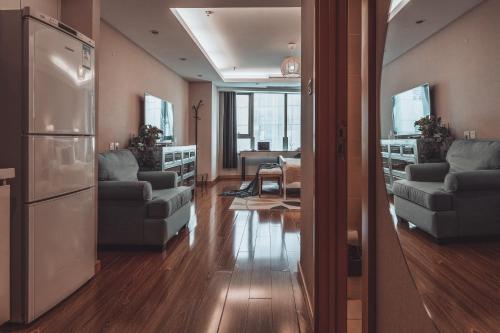 Χώρος καθιστικού στο Tianjin G'apartment - Five Great Avenues