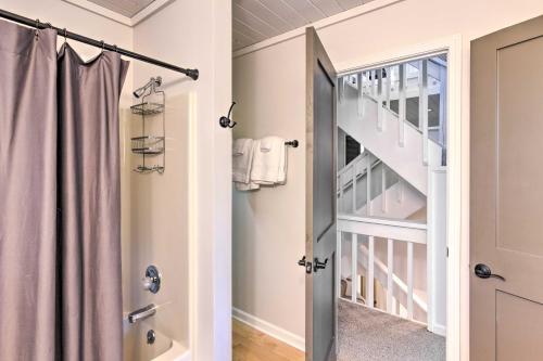 a bathroom with a shower and a staircase at Highlands Home with Fireplace, Views, and Trails! in Highlands