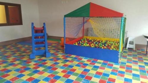 a childs play room with a play room with a play room at Apart Hotel Vista Azul - hospedagem nas montanhas in Domingos Martins