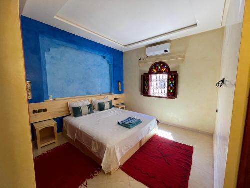 En eller flere senger på et rom på Dromadaire Gourmand