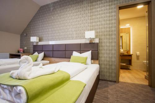 מיטה או מיטות בחדר ב-Veres Motel