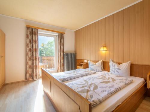 Postel nebo postele na pokoji v ubytování Ferienhaus Marina