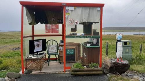 a food truck is parked on the side of the road at Norlande in Lerwick