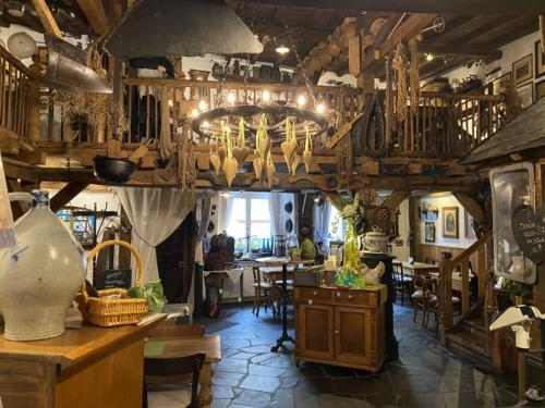 a room with a kitchen and a dining room at Haus Christine in Traben-Trarbach in Traben-Trarbach