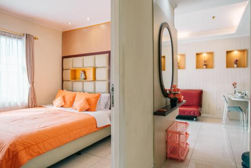 Säng eller sängar i ett rum på Ravarine Suite Apartment