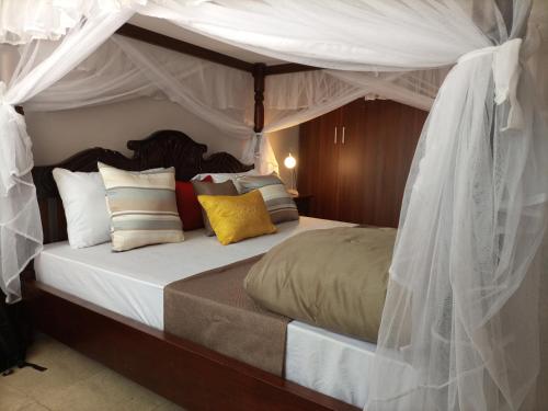 Ένα ή περισσότερα κρεβάτια σε δωμάτιο στο AVISHAI HOMES