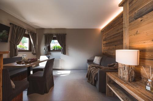 Posezení v ubytování Hotel Alù Mountain Design