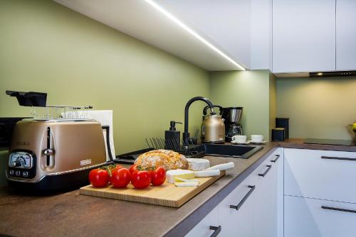 Η κουζίνα ή μικρή κουζίνα στο W&K Apartments - Balance Suite - Faktura VAT, Parking, Klimatyzacja