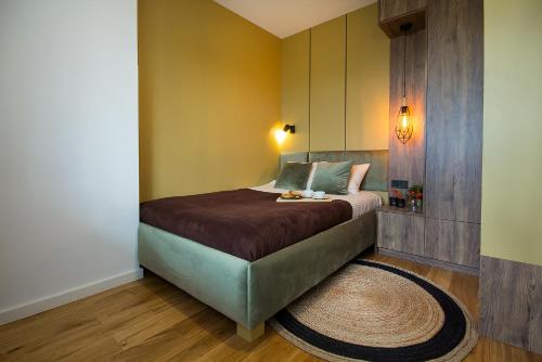 Ένα ή περισσότερα κρεβάτια σε δωμάτιο στο W&K Apartments - Balance Suite - Faktura VAT, Parking, Klimatyzacja