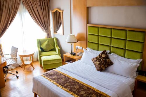 Postel nebo postele na pokoji v ubytování Hotel Sunshine Enugu
