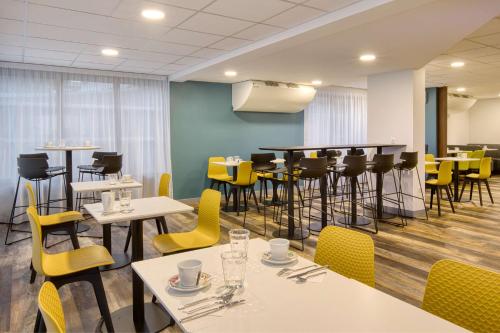 Sure Hotel by Best Western Les Portes de Montauban 레스토랑 또는 맛집