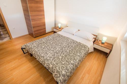 Postel nebo postele na pokoji v ubytování Apartman Marica with swimmingpool