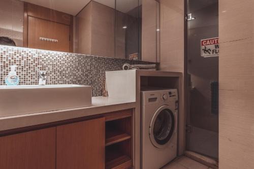 Η κουζίνα ή μικρή κουζίνα στο Tianjin G'apartment - Five Great Avenues