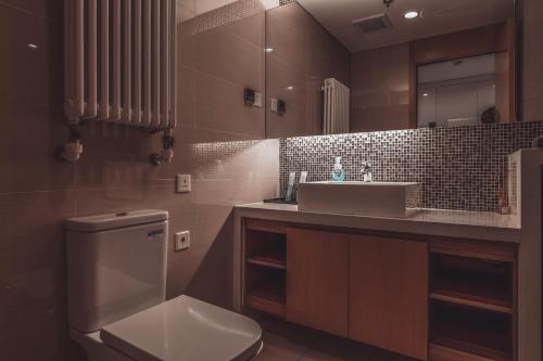 Ένα μπάνιο στο Tianjin G'apartment - Five Great Avenues