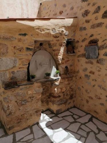 a model of a kitchen in a wooden building at Rodomelo Cute Studio 2 in Leonidion
