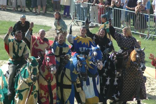a group of people dressed up in costumes on horses at Domfront - Numero CINQ in Domfront