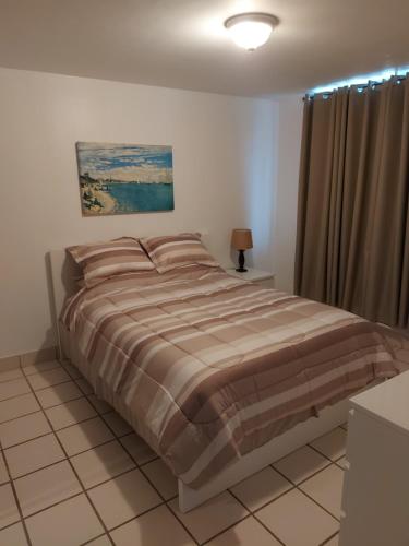 Postel nebo postele na pokoji v ubytování Condado San Juan Prime location 5minsWalk To Beach