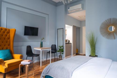 Letto o letti in una camera di Theatre Boutique Apartments