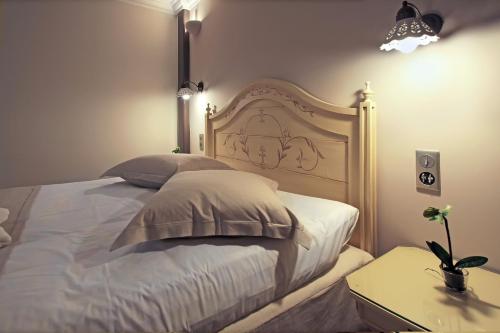Postel nebo postele na pokoji v ubytování Hotel Doltso