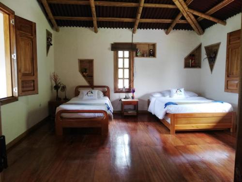 A bed or beds in a room at Finca TRADICIONAL EL OTOÑO