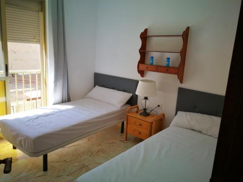 Postel nebo postele na pokoji v ubytování Habitación piso compartido Alquiler por temporada NO Turistico
