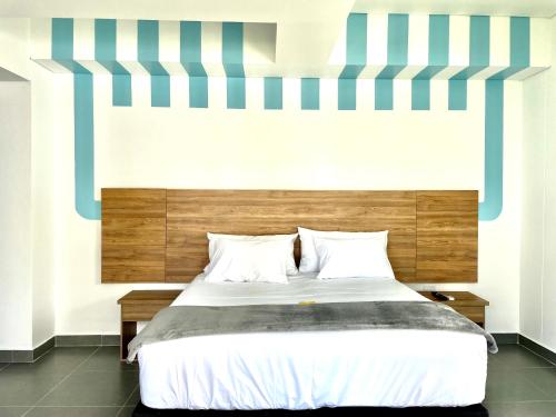 Llit o llits en una habitació de 3H Hotel Rodadero SANTA MARTA