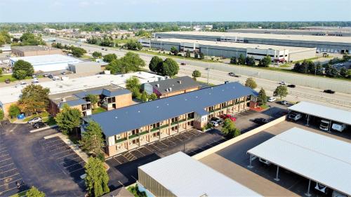 an aerial view of a town with a building at Americas Best Value Inn-Livonia/Detroit in Livonia