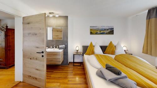 Postel nebo postele na pokoji v ubytování Ferienchalet Auszeit