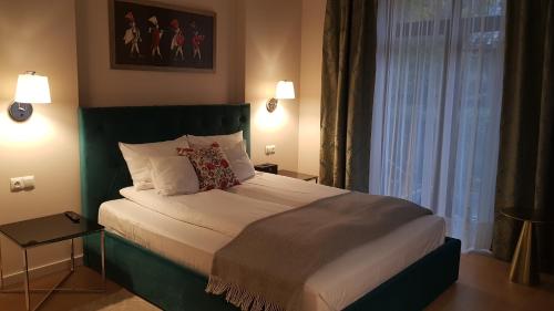 Postel nebo postele na pokoji v ubytování Altara Apartamenty Centrum - Free Parking