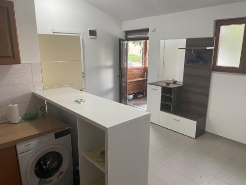 Kuchyň nebo kuchyňský kout v ubytování Family resort TRAPISTI