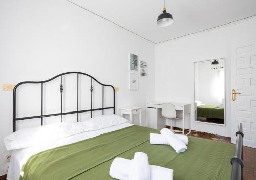Postel nebo postele na pokoji v ubytování La casa de la Playa. Piscina, Wifi y Terraza.