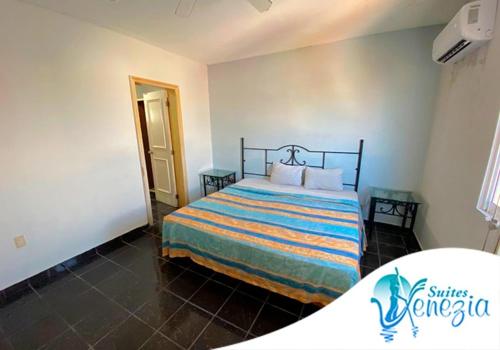 Ein Bett oder Betten in einem Zimmer der Unterkunft Hotel Playa María