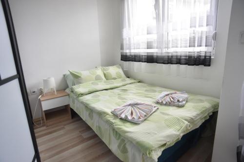 Krevet ili kreveti u jedinici u objektu SOKOLANA Apartments