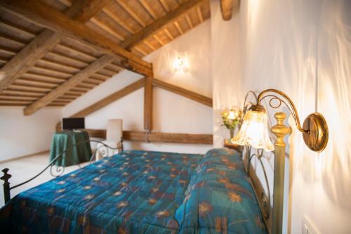 Katil atau katil-katil dalam bilik di Agriturismo Ae Cavane
